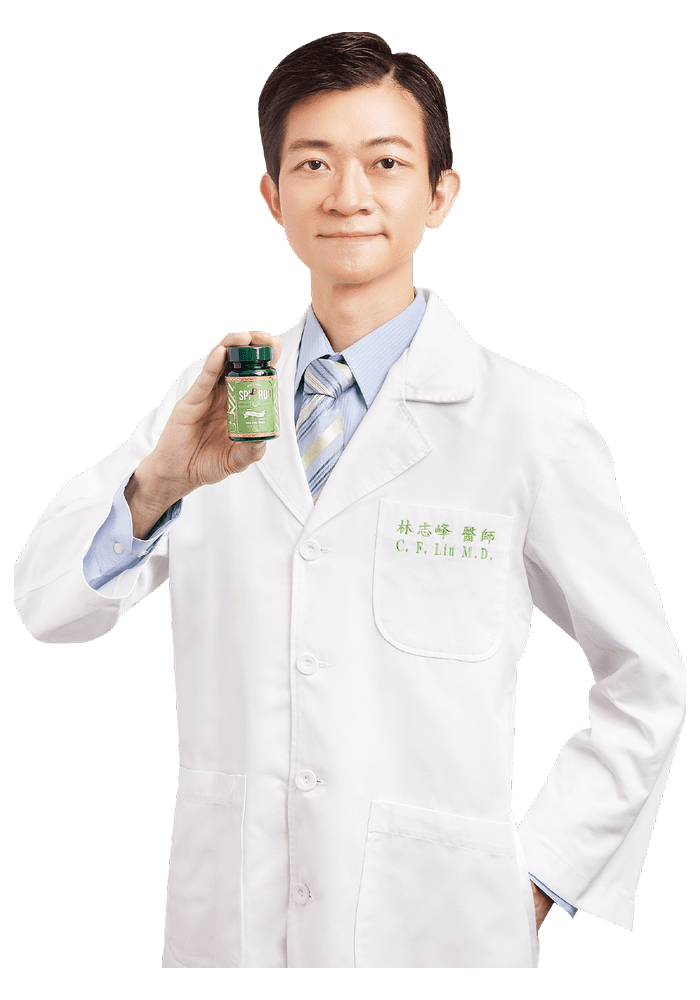 dr. C. F. Lin memegang SPIRO Tablet Dua Alga